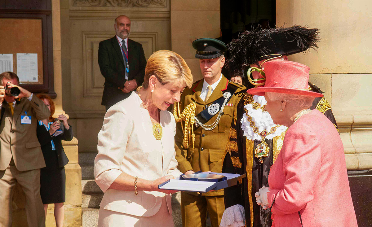 Dynamic Security Services Founder and Director, Owtar Sangha, guarding Queen Elizabeth II